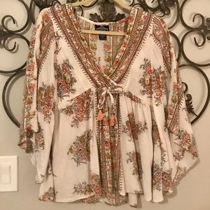 Wide arm quarter length shirt